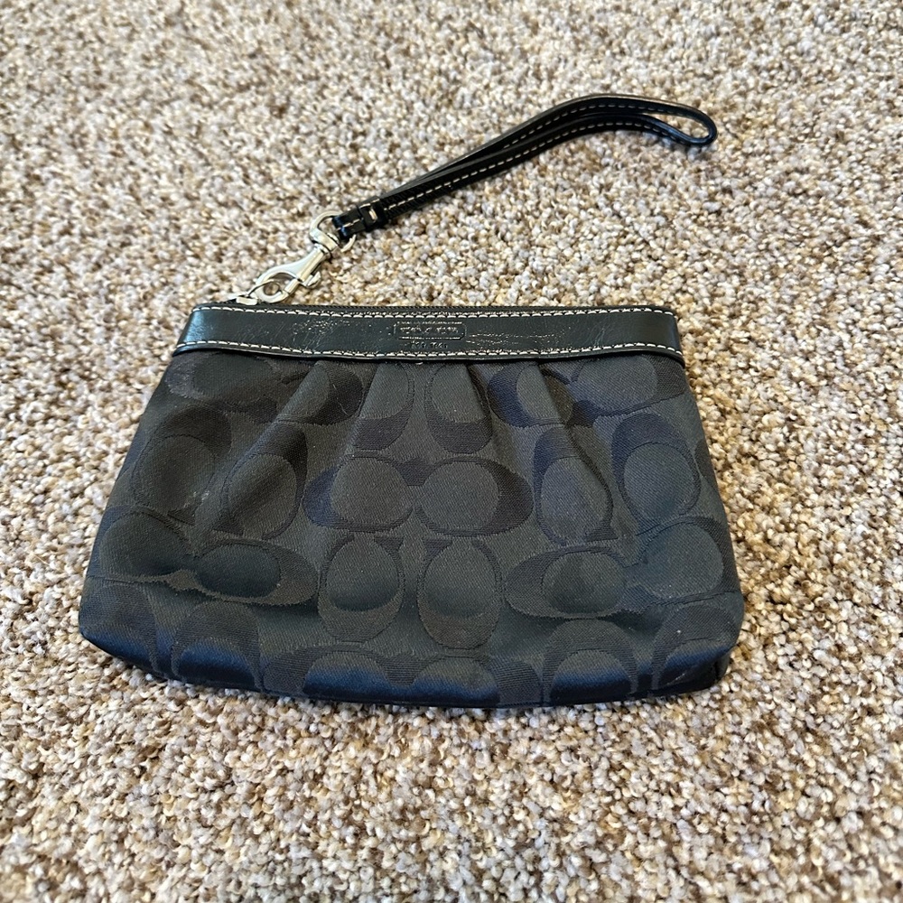 Small black Coach wristlet